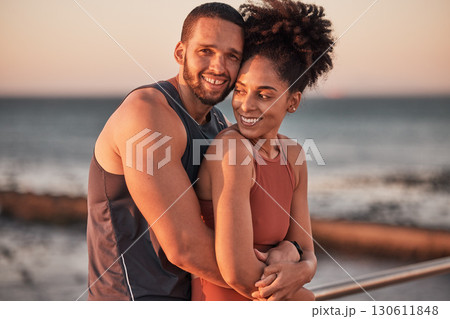 black couple, hug and relax beach fitness together for cardio workout, exercise training and freedom outdoor. Black man, woman smile and happy hugging by ocean sea for bonding or runner wellness rest 130611848