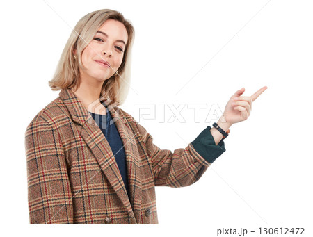 Portrait, brand and smiling woman pointing finger isolated against a studio white background. Happy, fashion and confident young female showing empty mock up space or direction to a promo 130612472