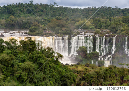 Powerful Iguazu Falls, one of the world's most impressive waterfalls. Brazil side. Brazilian wilderness landscape. 130612768