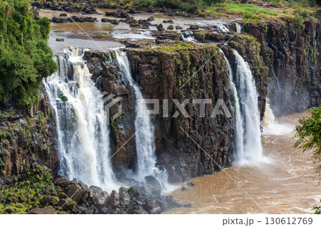 Powerful Iguazu Falls, one of the world's most impressive waterfalls. Brazil side. Brazilian wilderness landscape. 130612769