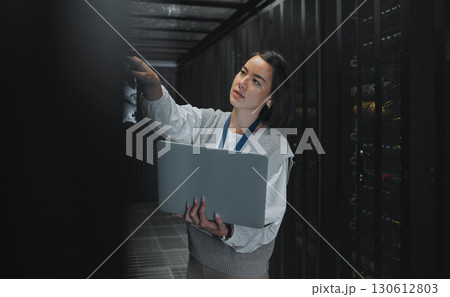 Laptop, maintenance or IT woman in server room for research, engineer working in data center. Computer, cybersecurity and girl programmer with tech for problem solving, diagnose or troubleshooting Laptop, maintenance or IT woman in server room for research, engineer working in data center. Computer, cybersecurity and girl programmer with tech for problem solving, diagnose or troubleshooting 130612803