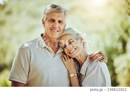 Portrait, love and senior couple outdoor, hug and bonding for romance, retirement and loving together. Romantic, old woman and mature man embrace, happiness or enjoy quality time in nature and relax 130612922
