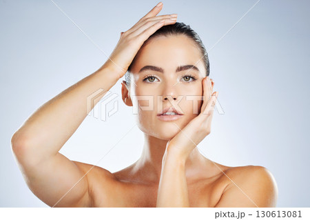 Beauty, skincare cosmetics and portrait of a woman isolated on a grey studio background. Glow, clean and face of a spa dermatology model with facial health, hydration and wellness on a backdrop Beauty, skincare cosmetics and portrait of a woman isolated on a grey studio background. Glow, clean and face of a spa dermatology model with facial health, hydration and wellness on a backdrop 130613081
