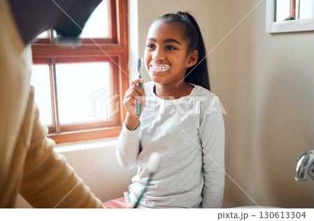Daughter, father and brushing teeth in a bathroom for hygiene, grooming and bonding. Oral care, girl and parent for morning cleaning while having fun with black family who laugh and smile at home Daughter, father and brushing teeth in a bathroom for hygiene, grooming and bonding. Oral care, girl and parent for morning cleaning while having fun with black family who laugh and smile at home 130613304
