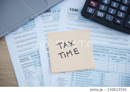 Tax time, accounting paperwork and form for government law compliance, file income revenue return or self assessment. Calculator, sticky note and finance audit form for financial payment and taxes Tax time, accounting paperwork and form for government law compliance, file income revenue return or self assessment. Calculator, sticky note and finance audit form for financial payment and taxes 130613592