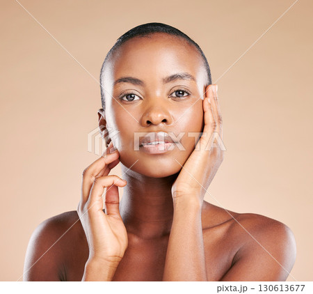 Black woman, portrait and facial makeup in skincare cosmetics for beauty isolated against studio background. African American female model, person or lady touching face glow, smooth or perfect skin Black woman, portrait and facial makeup in skincare cosmetics for beauty isolated against studio background. African American female model, person or lady touching face glow, smooth or perfect skin 130613677