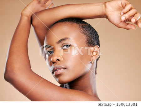 Hands, skincare aesthetic and portrait of black woman to promote luxury treatment, cosmetics and makeup. Spa wellness, beauty and female model on brown background for facial, shine and glowing skin Hands, skincare aesthetic and portrait of black woman to promote luxury treatment, cosmetics and makeup. Spa wellness, beauty and female model on brown background for facial, shine and glowing skin 130613681