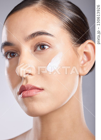 Beauty, face and woman with facial cream for healthcare girl, wellness routine or luxury acne prevention. Spa salon, dermatology skincare ointment and aesthetic self care model with collagen product 130613926