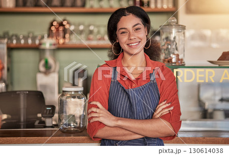 Portrait, cafe waiter and woman with arms crossed ready to take your order. Coffee shop, barista and confident, happy and proud young female employee from Brazil or small business owner of cafeteria. Portrait, cafe waiter and woman with arms crossed ready to take your order. Coffee shop, barista and confident, happy and proud young female employee from Brazil or small business owner of cafeteria. 130614038