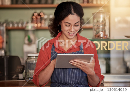 Small business, cafe barista and woman with tablet to manage orders, inventory and stock check. Coffee shop waiter, technology and happy young female waitress with touchscreen for managing sales. Small business, cafe barista and woman with tablet to manage orders, inventory and stock check. Coffee shop waiter, technology and happy young female waitress with touchscreen for managing sales. 130614039