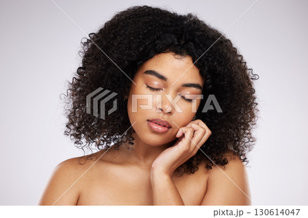 Skincare, cosmetics and black woman with eyes closed and hand on face, afro and advertising luxury makeup product promo. Dermatology, beauty and facial care on model isolated on studio background. Skincare, cosmetics and black woman with eyes closed and hand on face, afro and advertising luxury makeup product promo. Dermatology, beauty and facial care on model isolated on studio background. 130614047