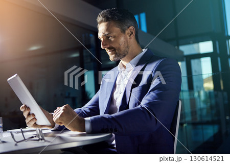 Thinking, tablet and working business man planning with web finance trading analytics. Office, accounting investment employee and boss typing a tech strategy report for a stock market company 130614521