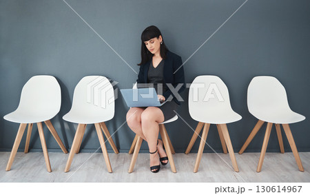 Laptop, recruitment and business woman in waiting room for interview with human resources. Hr hiring, job opportunity and female employee with computer for email in company office for employment. 130614967
