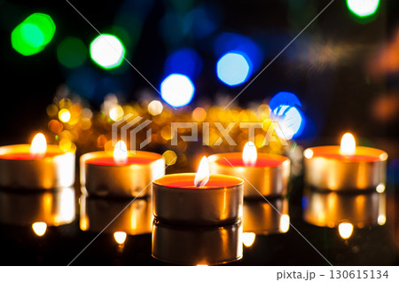 Candlelight pierces the darkness like an echo of an ancient legend Candlelight pierces the darkness like an echo of an ancient legend 130615134