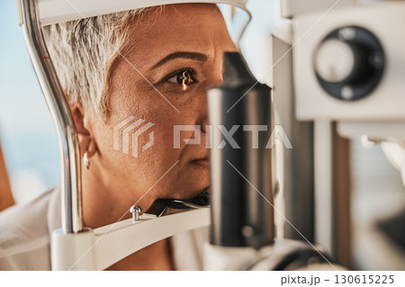 Medical, ophthalmology and eye test by patient senior woman with medical insurance using slit lamp. Mature, optometry and female doing vision or eyesight test in clinic using a machine Medical, ophthalmology and eye test by patient senior woman with medical insurance using slit lamp. Mature, optometry and female doing vision or eyesight test in clinic using a machine 130615225