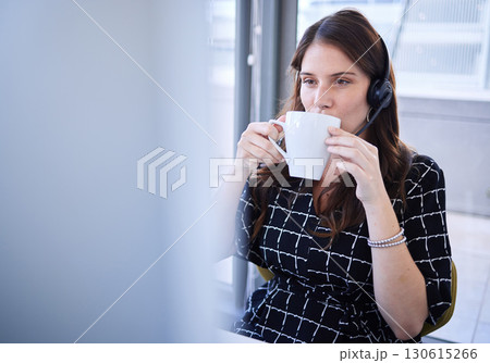 Call center, coffee and person thinking of sales, telemarketing or crm strategy on her computer. Telecom, online financial advisor or virtual support agent, consultant or woman drinking tea for ideas Call center, coffee and person thinking of sales, telemarketing or crm strategy on her computer. Telecom, online financial advisor or virtual support agent, consultant or woman drinking tea for ideas 130615266