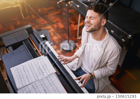 Top view, piano and man singing, creative and training for performance, show or talent. Male artist with skills, recording studio or singer with keyboard, vocal practice or playing musical instrument Top view, piano and man singing, creative and training for performance, show or talent. Male artist with skills, recording studio or singer with keyboard, vocal practice or playing musical instrument 130615293