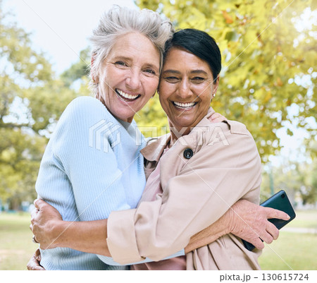 Senior women, bonding or hug portrait in nature park, garden or relax environment for social media, profile picture or memory. Smile, happy friends or retirement elderly embrace for mobile technology Senior women, bonding or hug portrait in nature park, garden or relax environment for social media, profile picture or memory. Smile, happy friends or retirement elderly embrace for mobile technology 130615724