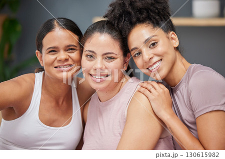 Support, portrait or women in yoga class with a happy smile after group training exercise or fitness workout together. Trust, faces or healthy friends hugging, bonding or relaxing in zen home studio Support, portrait or women in yoga class with a happy smile after group training exercise or fitness workout together. Trust, faces or healthy friends hugging, bonding or relaxing in zen home studio 130615982