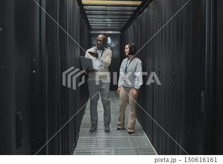 Server room, teamwork or people on laptop for software management, system upgrade or cyber security. Network technician, engineer or programmer staff on tech for information technology or programming 130616161