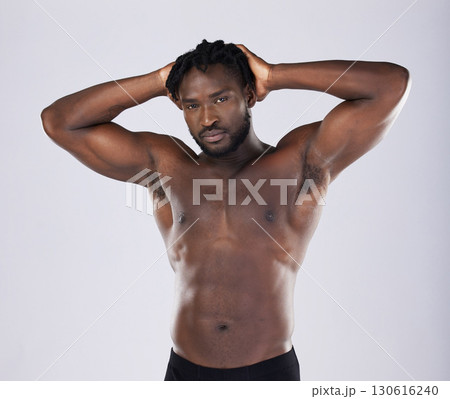 Sexy body, fitness and black man portrait for sports person in studio for strong muscle and power. Health and wellness of a male bodybuilder model with growth after exercise, workout and training 130616240