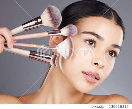Woman, face beauty and makeup tools for skincare wellness, cosmetics dermatology and luxury salon product vision. Model, facial care and application brush for self care grooming and youth lifestyle Woman, face beauty and makeup tools for skincare wellness, cosmetics dermatology and luxury salon product vision. Model, facial care and application brush for self care grooming and youth lifestyle 130616312
