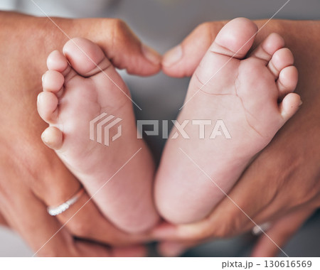 Baby, feet and hands of mother closeup with newborn for love, care or family bond in their home. Zoom, mom and foot of infant for motherhood, protection or child development, maternity and caring Baby, feet and hands of mother closeup with newborn for love, care or family bond in their home. Zoom, mom and foot of infant for motherhood, protection or child development, maternity and caring 130616569