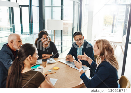 Company vision and mission of business people in meeting at corporate workplace together. Collaboration, brainstorming and strategy of focused interracial employees in business meeting. 130616754