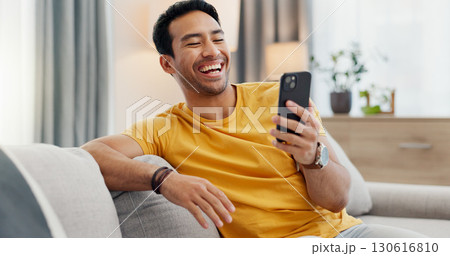 Laugh, video call and man on sofa with phone for connection, social networking and online chat. Relax, home and person on smartphone for communication, internet and funny conversation on mobile app Laugh, video call and man on sofa with phone for connection, social networking and online chat. Relax, home and person on smartphone for communication, internet and funny conversation on mobile app 130616810