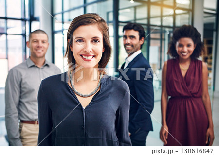 Business woman, happy and leader portrait while in a office with management team for growth. Face of corporate female entrepreneur for diversity, motivation and vision for innovation in a workplace Business woman, happy and leader portrait while in a office with management team for growth. Face of corporate female entrepreneur for diversity, motivation and vision for innovation in a workplace 130616847