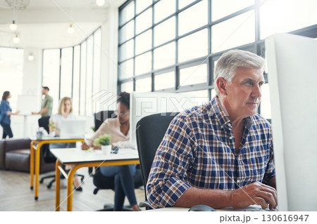 Business, office building and senior man with computer working on website research, email and project. Productivity, corporate agency and elderly worker at desk for planning, schedule and strategy 130616947