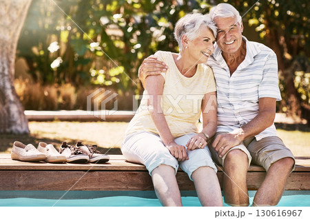 Senior couple, hug and swimming pool for summer vacation, love or relax spending quality bonding time together. Happy elderly man holding woman relaxing with feet in water by the poolside outside Senior couple, hug and swimming pool for summer vacation, love or relax spending quality bonding time together. Happy elderly man holding woman relaxing with feet in water by the poolside outside 130616967