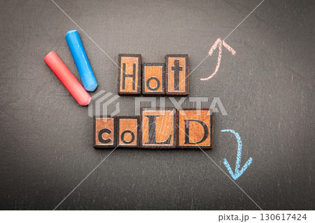 Hot and cold contrast concept with chalk arrows and blocks Hot and cold contrast concept with chalk arrows and blocks 130617424