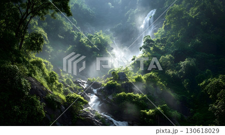 Realistic photo of tropical rainforest waterfall with mist and sunlight 130618029