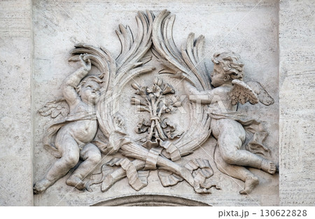 Angels with symbols of martyrdom on the portal of Sant Andrea della Valle Church in Rome, Italy 130622828
