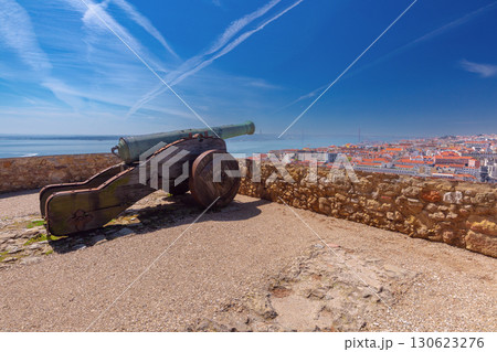 Cannon Overlooking Lisbon from Historic Fortress in Portugal Cannon Overlooking Lisbon from Historic Fortress in Portugal 130623276
