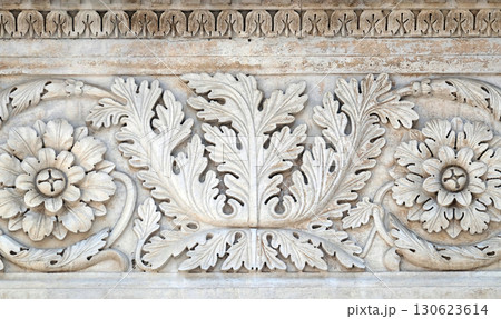 Stone carvings on the portal of Santa Maria Forisportam church in Lucca, Tuscany, Italy 130623614