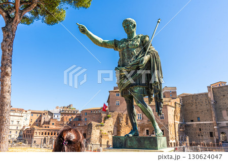 Emperor Augustus points his finger where to go. Statue in Rome Italy monument 130624047