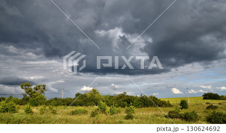 Rural landscape with stormy sky, Russia Rural landscape with stormy sky, Russia 130624692