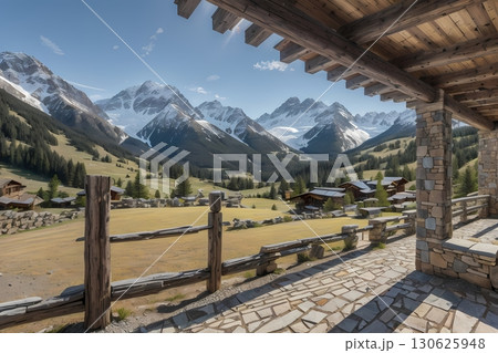 Nestled in the cradle of towering peaks, the mountain hamlet exudes an aura of ancient mystique. 130625948