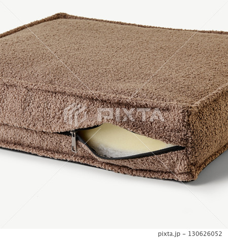 Brown cushion cover showing foam insert and zipper closure 130626052
