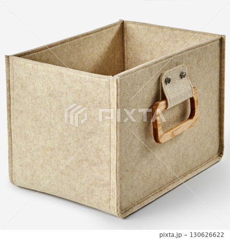 Empty beige felt storage box with wooden handle on white background 130626622