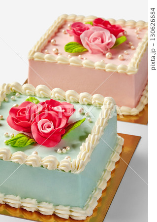 Delicious square cakes decorated with fondant roses and pearls Delicious square cakes decorated with fondant roses and pearls 130626684