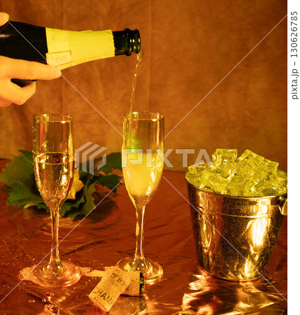 Serving Champagne in Celebration Glasses Serving Champagne in Celebration Glasses 130626785
