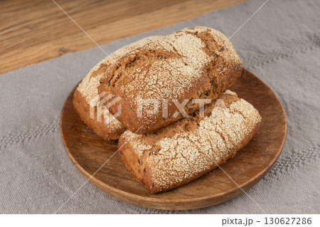 Whole wheat brown bread, fitness pumpkin carrot buns with seeds, cereal bread grain bun 130627286