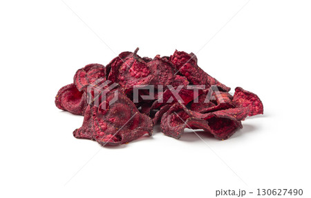 Dry beetroot chips isolated, dried sliced red beet flakes pile, beet root pieces and chips Dry beetroot chips isolated, dried sliced red beet flakes pile, beet root pieces and chips 130627490