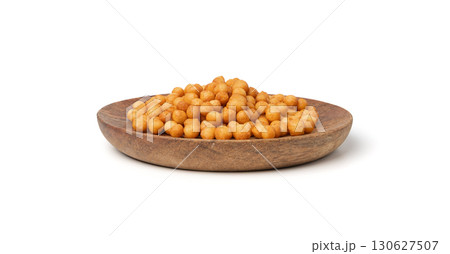 Small pastry balls, fried crispy wheat soup pearls, salad egg puffs or choux pastry 130627507