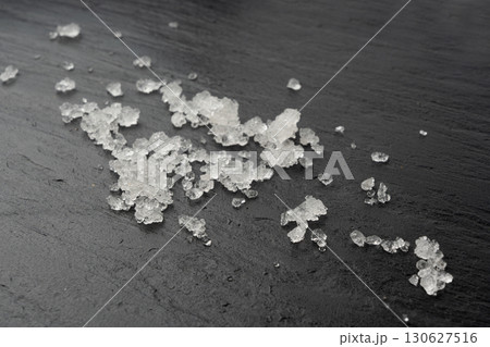 Dead sea salt pile, white crystals for body spa, sodium chloride similar to crushed ice, spa scrub Dead sea salt pile, white crystals for body spa, sodium chloride similar to crushed ice, spa scrub 130627516