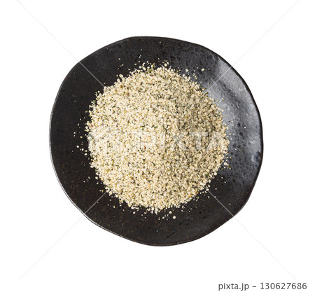 Shelled hemp seeds pile isolated, peeled cannabis grains, marijuana kernels without peel 130627686