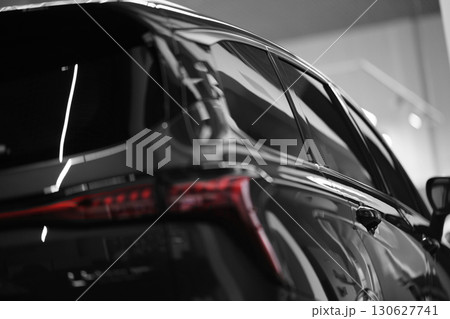 The body of a new car. Rear view. Car in the store showroomHigh quality photo 130627741